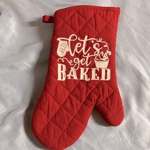 Red and white oven mitt